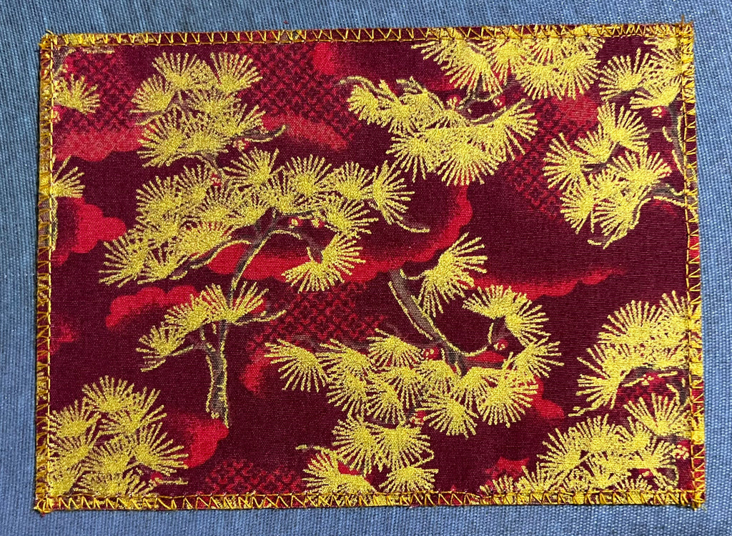 Japanese Gold Pine on Burgandy