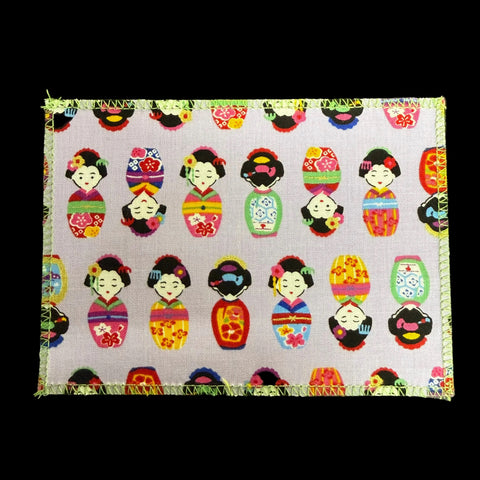 Japanese Kokeshi Dolls on Purple