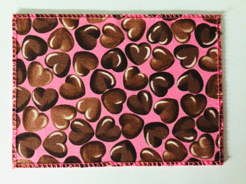 Chocolate Hearts on Pink